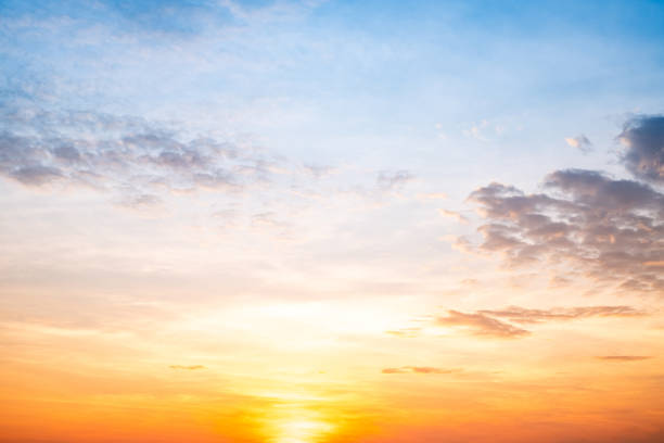 istock Beautiful , luxury soft gradient orange gold clouds and sunlight on the blue sky perfect for the background, take in everning,Twilight, Large size, high definition landscape photo 2182452040