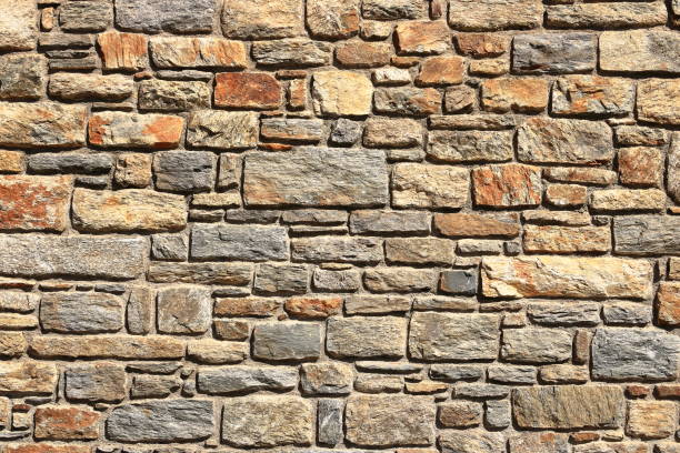 istock yellow beige sand color stone brick vertical wall 2182453013