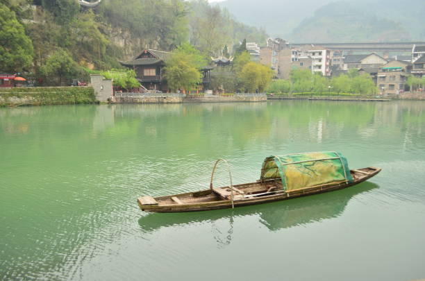 istock traditional boat on the river 2182453520
