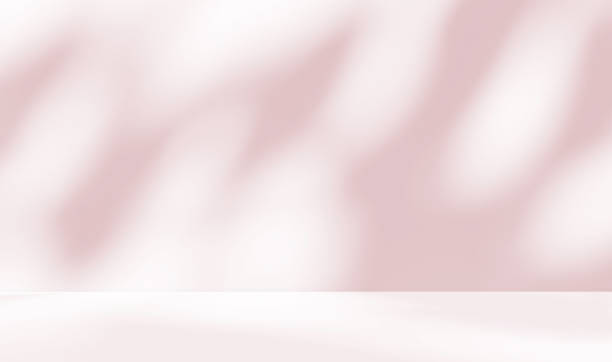 istock Empty pink colour room studio with sunlight effect shadow on the floor and wall for product presentation. 2182460913