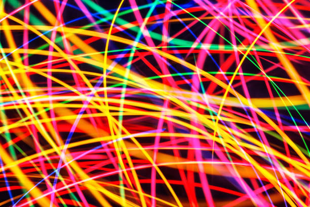 Unique design concept with glowing bulbs in motion. Vibrant, artistic modern background.