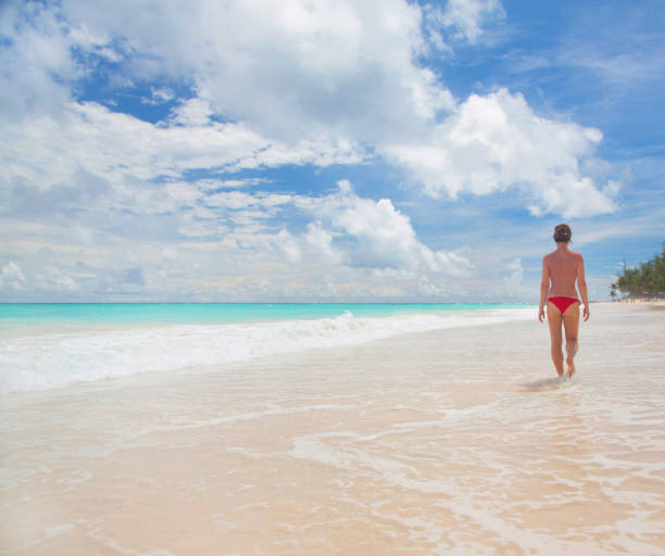 Barbados, Girl on caribbean beach.