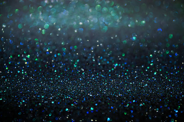 istock Dark blue shining glitter background Defocused bokeh 2182472220