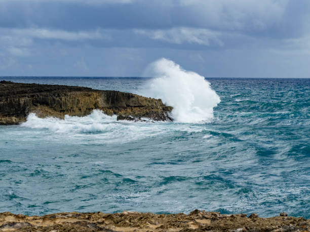 istock waves crashing into a clifff in Hawaii 2182477495