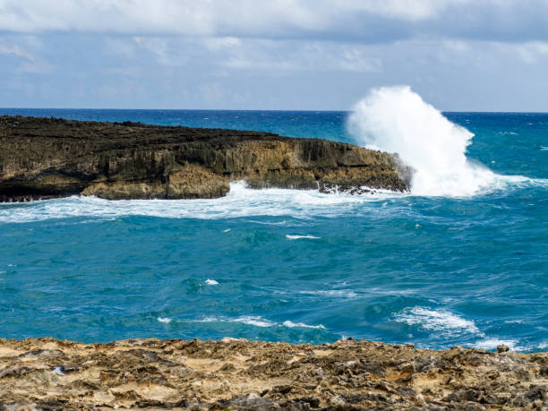 istock waves crashing into a clifff in Hawaii 2182478134