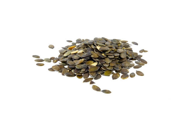 istock pile of pumpkin seeds isolated on white 2182479985