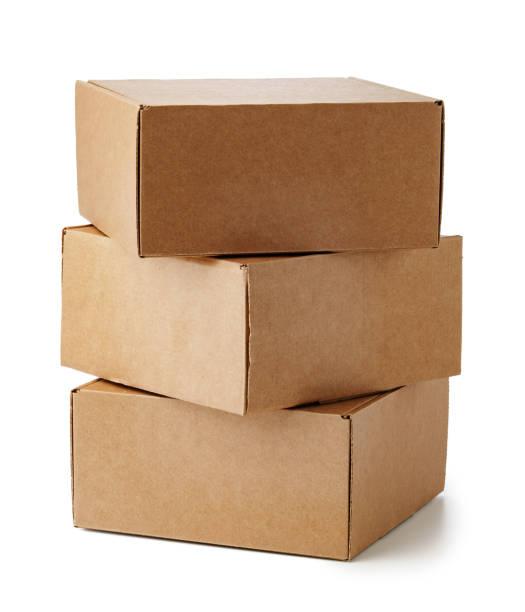 Stacked brown cardboard boxes in various sizes arranged on a white background