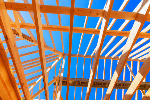 istock Home under construction with timber trusses framed construction roofing a joints 2182487102