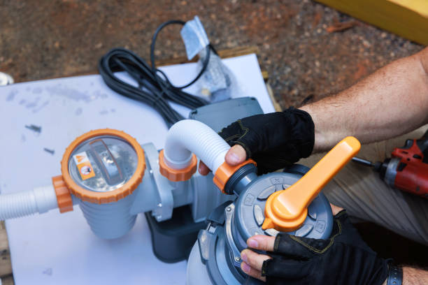 istock Assembling sand filter system tank, equipment for cleaning water in a swimming pool 2182487176