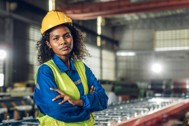 istock Foreman or worker work at factory site check up machine or products in site. 2182492928