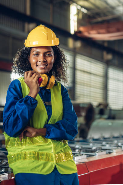 istock Foreman or worker work at factory site check up machine or products in site. 2182492931