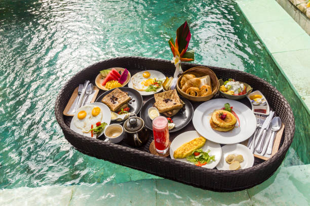istock Floating breakfast in a swimming pool 2182502163