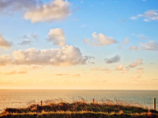Sunrise viewed from the cliff top on the military road, freshwater. Isle of Wight