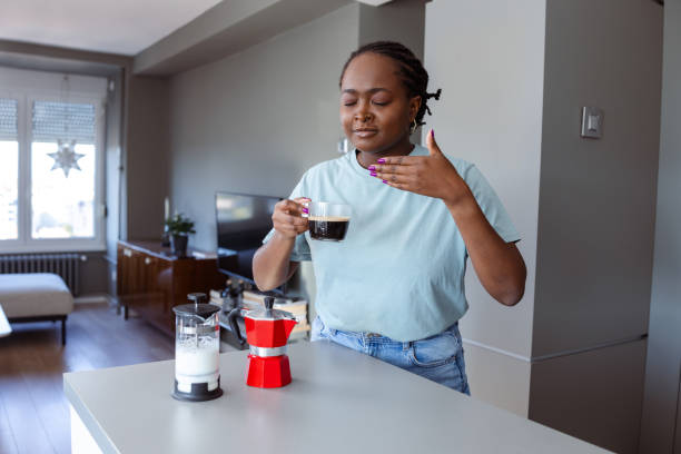 istock African American made fresh coffee at home with moka pot 2182515708