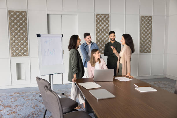 istock Diverse group of business colleagues brainstorming on Internet startup 2182519625