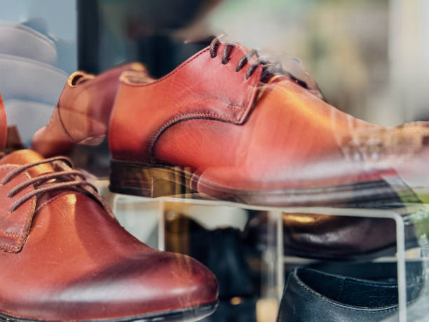 istock Abstract Display of red leather shoes with laces 2182520000
