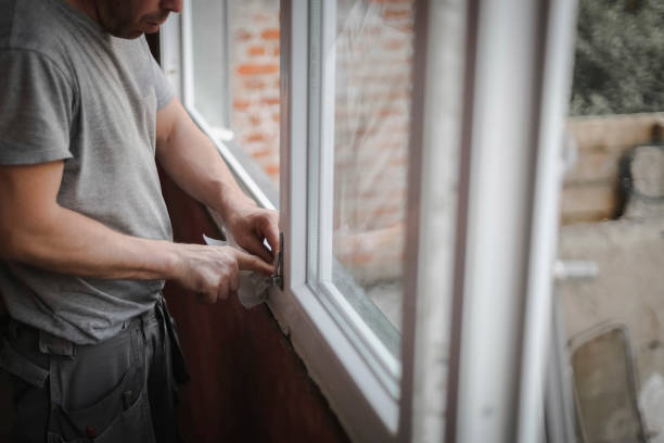 istock Caucasian man cleans the window frame. 2182522513