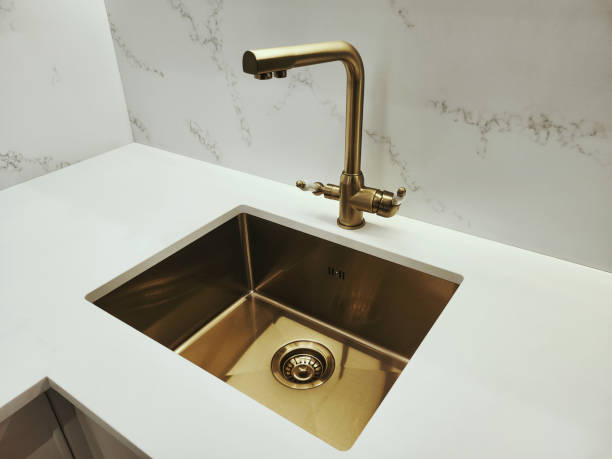 istock Bronze ball mixer with ceramic handle and bronze sink with drain 2182524536