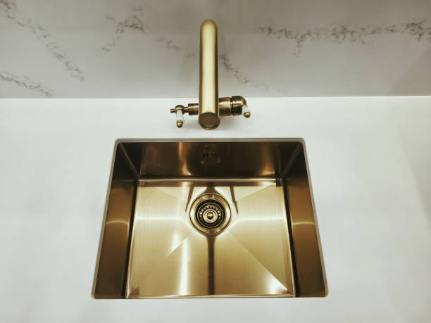 istock Bronze ball mixer with ceramic handle and bronze sink with drain 2182524670
