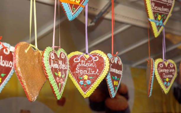 istock Colorful hanging heart-shaped gingerbread cookies 2182528684
