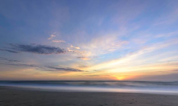 istock Beautiful sunrise on the beach 2182537647