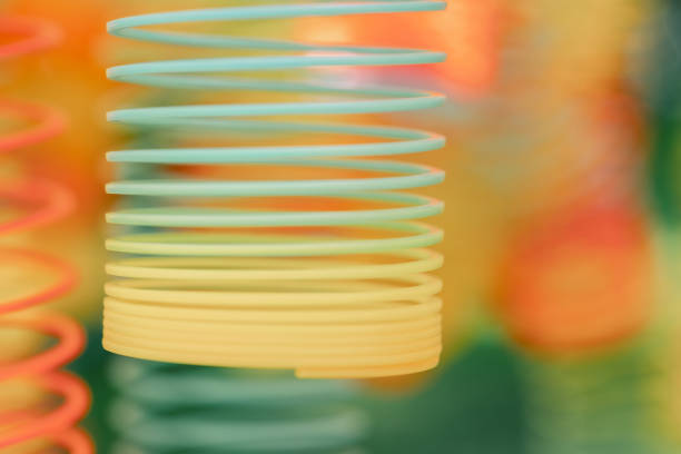 Lots of bright colorful spirals. Abstract blurred background with selective focus on waves. High quality photo