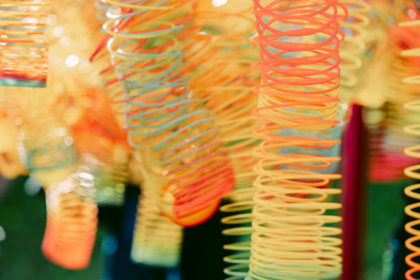 Lots of bright colorful spirals. Abstract blurred background with selective focus on waves. High quality photo