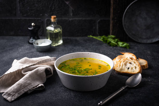 istock Chicken broth with parsley, healthy food 2182552043