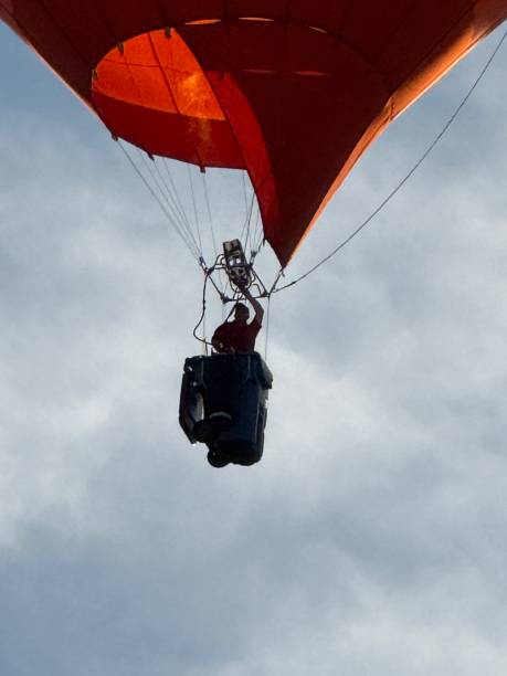 istock Garbage can used as a basket for a hot air balloon. 2182552252