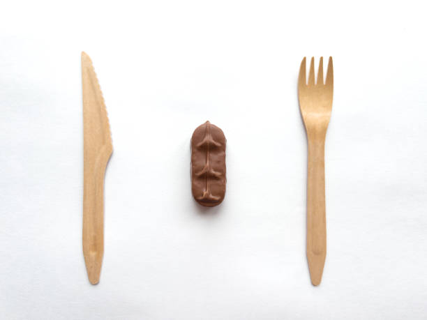 istock Minimalist composition with wooden cutlery and chocolate 2182553081