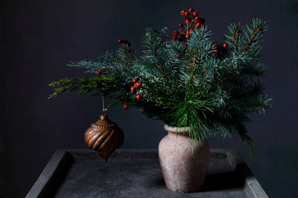 Evergreen bouquet with rusty christmas ornament