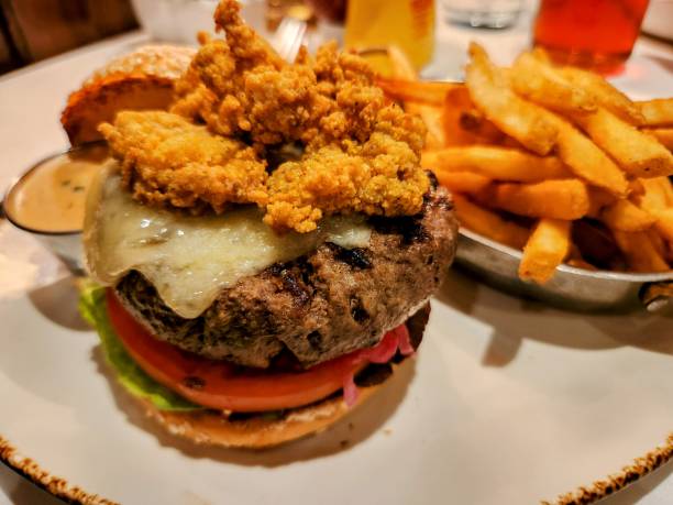 istock Classic American Cheeseburger on Brioche Bun with Fried Oysters 2182556513