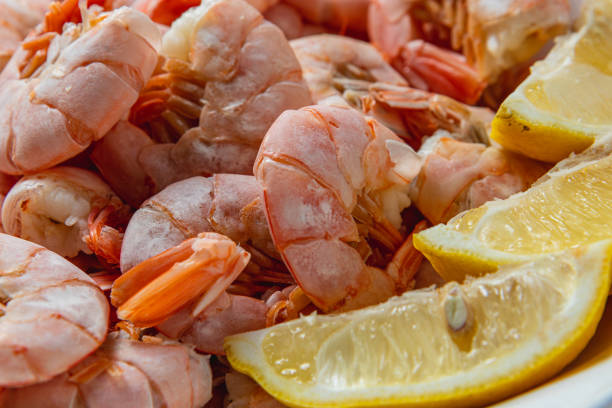 istock Boiled king prawns in a deep bowl with lemon 2182559410