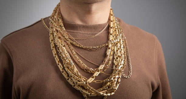 istock Caucasian man with a golden necklaces. 2182565505