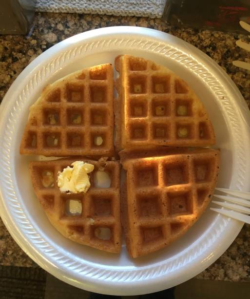 istock Freshly Made Waffle on a Styrofoam Plate 2182570216