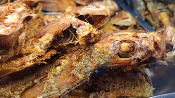 istock Crispy Perfection: The Art of Indonesian Fried Fish 2182571192