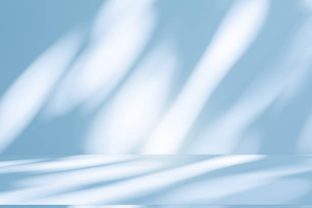istock Studio style background wall decoration presentation uses white and blue tones. with shadows cast from a nearby window, concept creating a decorative 2182574415