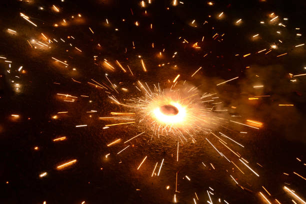 Fireworks exploding colorful in a dark night sky to celebrate New Year, Almere, Flevoland, Netherlands, January 01, 2025