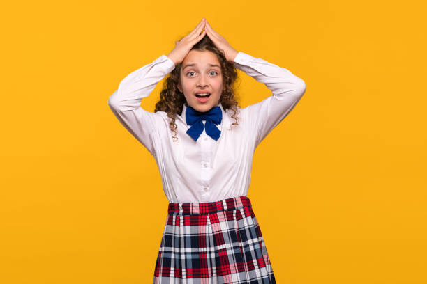 istock Girl holding head with both hands 2182593068