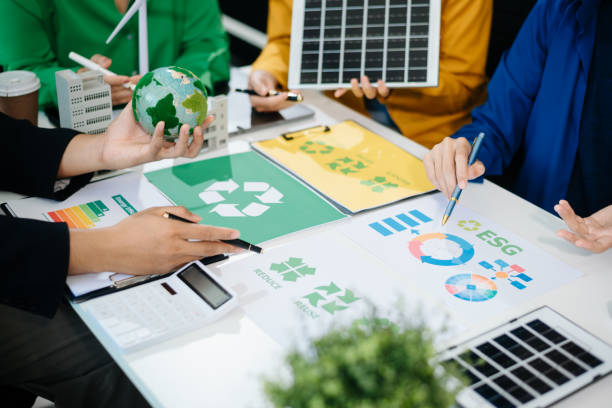 istock Business team working virtual modern smartphone to reduce CO2 emissions carbon footprint climate change to limit global warming 2182598202