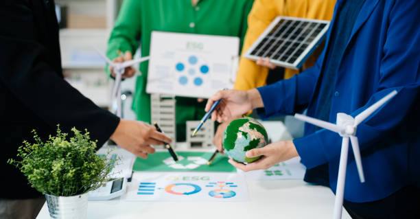 istock Business team working virtual modern smartphone to reduce CO2 emissions carbon footprint climate change to limit global warming 2182598214