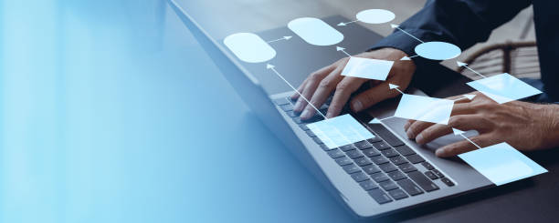 istock Businessman hands typing on laptop, empty workflow diagram. Copy space 2182599193