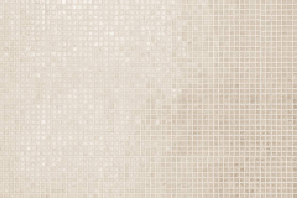 istock Cream light ceramic wall and floor tiles mosaic background in bathroom and kitchen. Design pattern geometric with grid wallpaper texture decoration pool. Simple seamless abstract surface clean. 2182599897