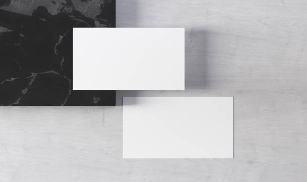 istock Blank business cards on white wood desk 2182605541