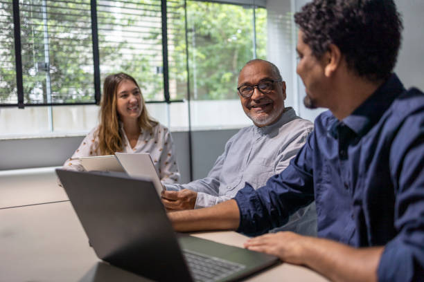 istock Group of white-collar workers in office meeting 2182606210
