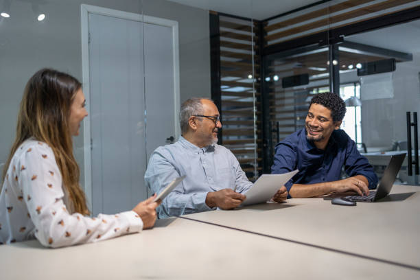 istock Group of white-collar workers in office meeting 2182606256