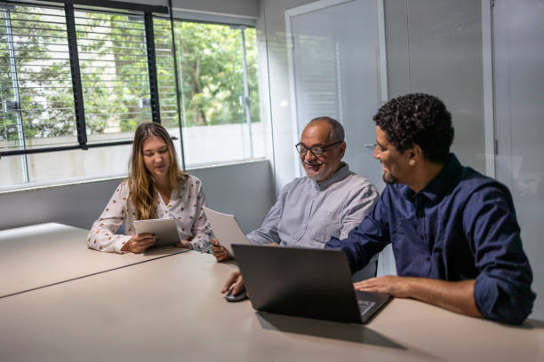 istock Group of white-collar workers in office meeting 2182606261