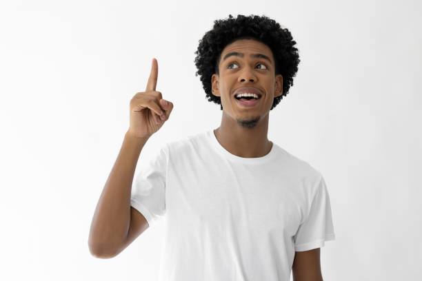 istock African young male pointing up 2182609568