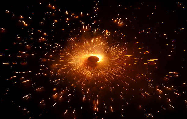 Fiery circle of life on black smoke backdrop. Round symbolism, fire sparks depict the eternal rhythm of existence and transformation.