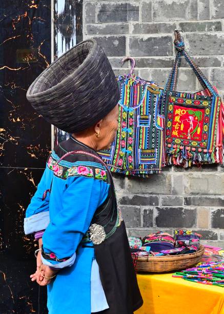 China, Hunan Province,Xiangxi Tujia and Miao Autonomous Prefecture,\nMiao women have a variety of headwear, such headwear is relatively rare to see.
